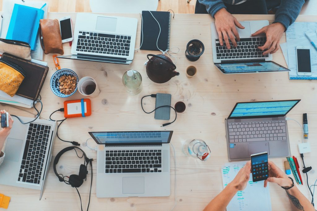 Several laptops on desk