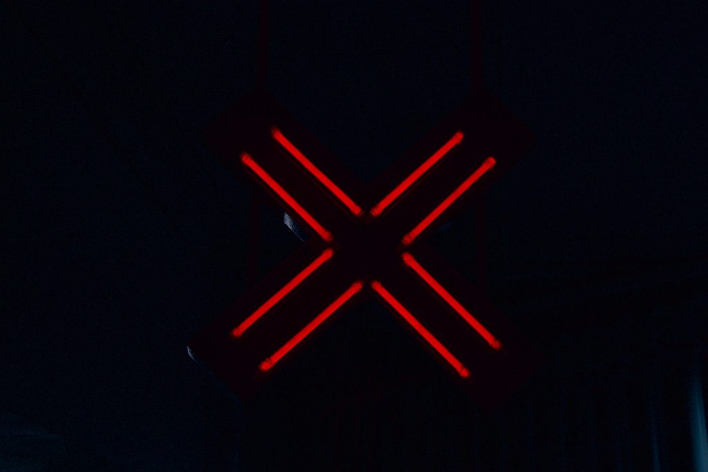 X sign