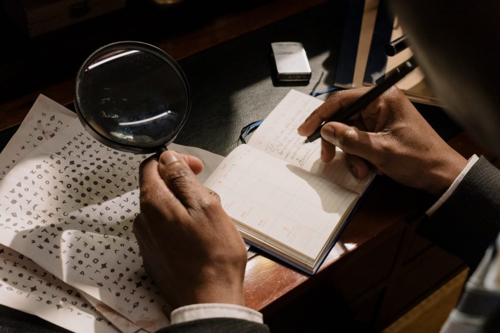 Man using magnifying glass